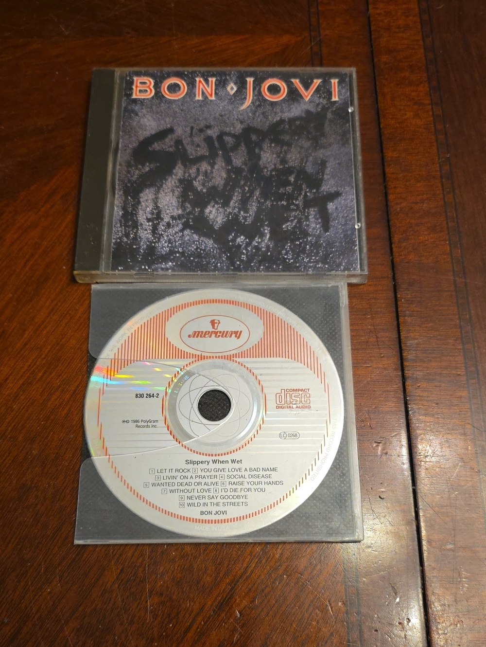 Bon Jovi "Slippery When Wet" CD - Black & Orange Cover